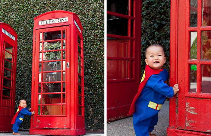 Fotos de superman apoyado en cabina de teléfonos de Londres superhéroe