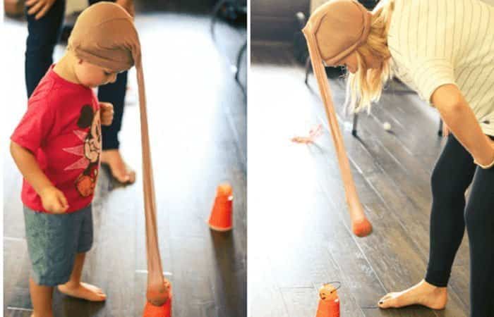 Crear una trompa de elefante con unos pantis y una pelota de tenis para jugar a los bolos elefante jugando a los bolos