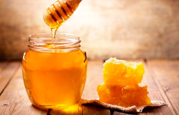 Tarro de miel. Alimentos que nos hacen felices