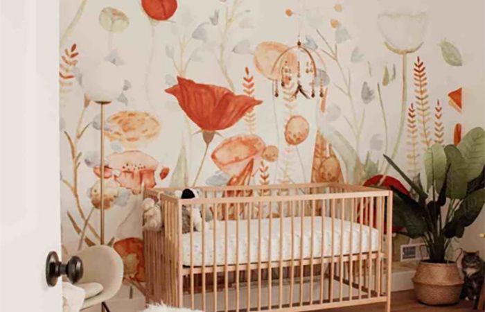 Elementos decorativos en naranja decoración de pared de habitación de bebé con grandes flores en tonos naranjas
