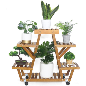 decorar con bambú: soporte para plantas