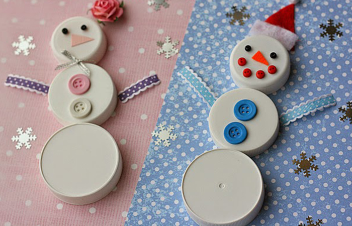 Cómo hacer un hombre de nieve con tapones hombre de nieve con tapones