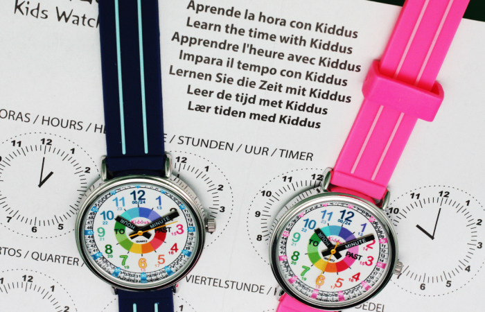 reloj educativo para aprender a leer la hora, en negro y rosa reloj educativo